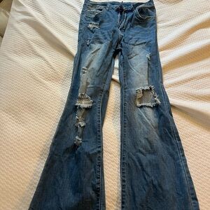 Distressed Blue Jeans